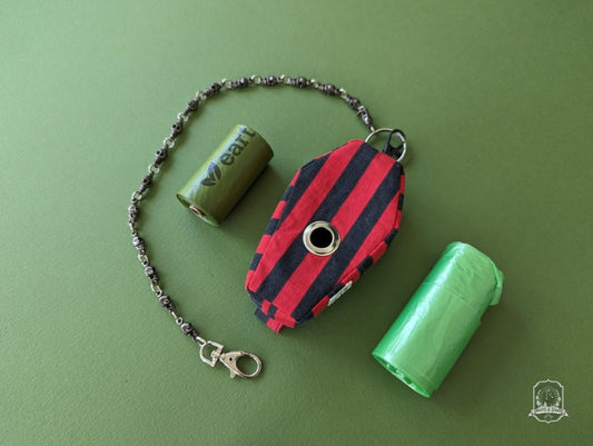 coffin poop bag dispenser red black stripes made with sustainable practices