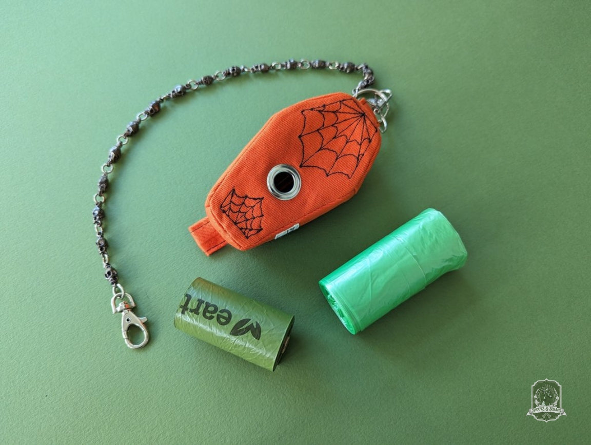 handmade coffin poop bag holder with embroidered spider webs