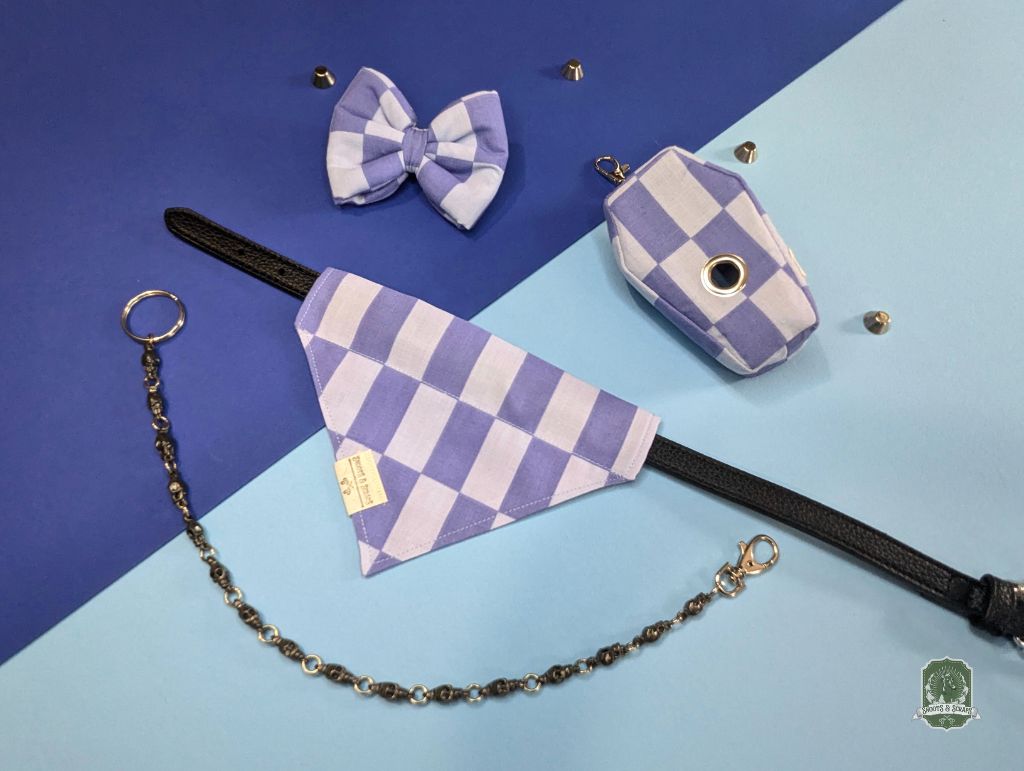 Pet accessory set with checkered pattern on a blue and purple background