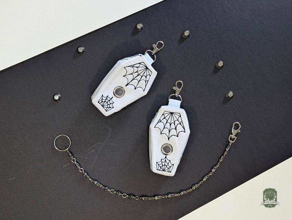 The Ghost Coffin | White with Black Spiderwebs | Poo Bag Holder