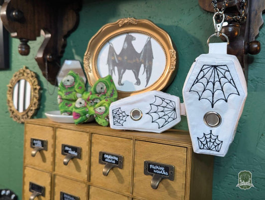 The Ghost Coffin | White with Black Spiderwebs | Poo Bag Holder