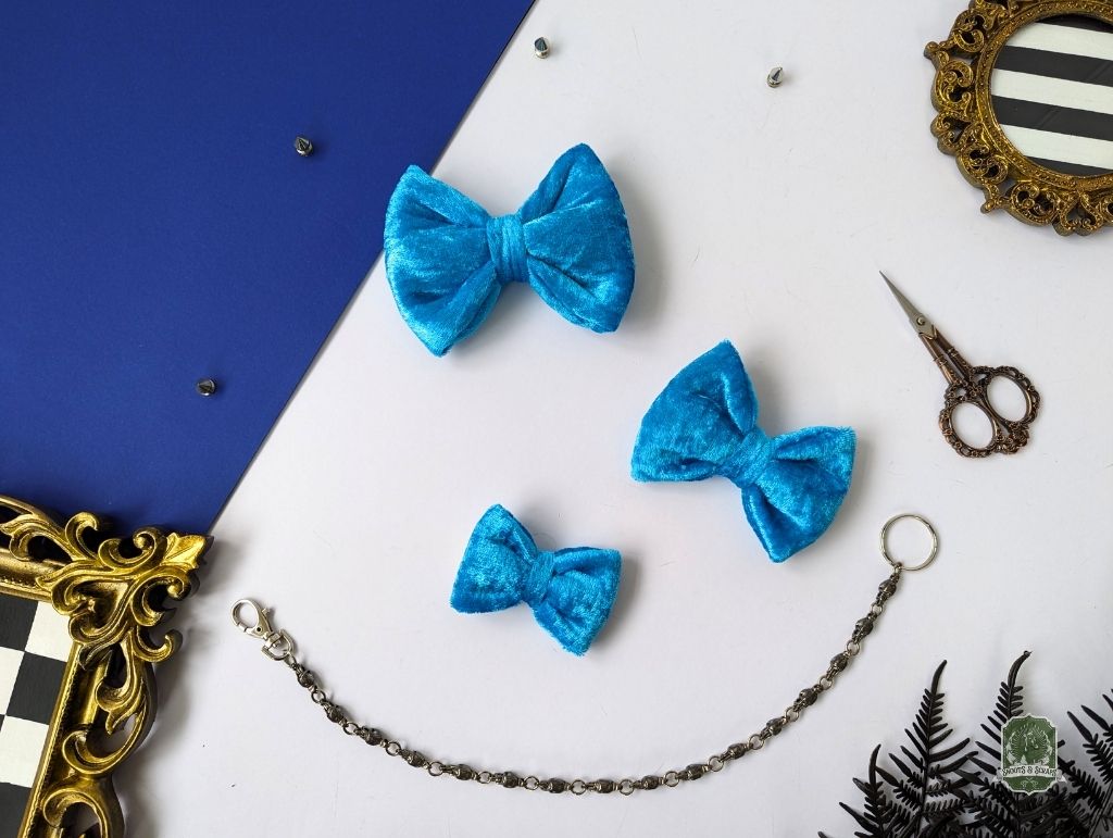 display sizing of bright blue bow tie, small, medium and large