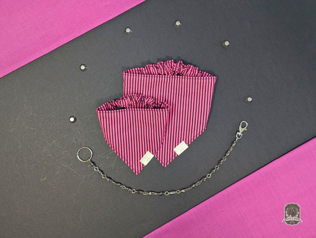 Pink and black striped dog bandanas with elasticated collar, with chain on a black and pink background