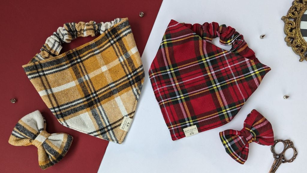 Plaid dog bandanas and bow ties on a red and white background with decorative elements.