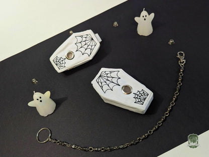 The Ghost Coffin | White with Black Spiderwebs | Poo Bag Holder