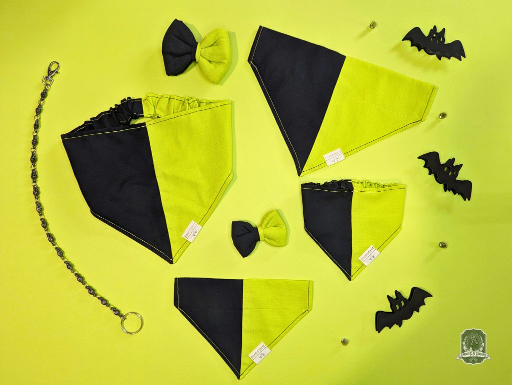 Black and yellow dog bandanas with matching bow ties accessories on a yellow background