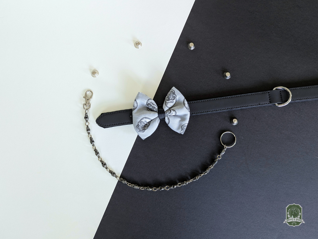 Grey fabric with skulls pattern pet bow tie