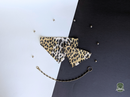 Leopard print pet bandanas on a black and white background