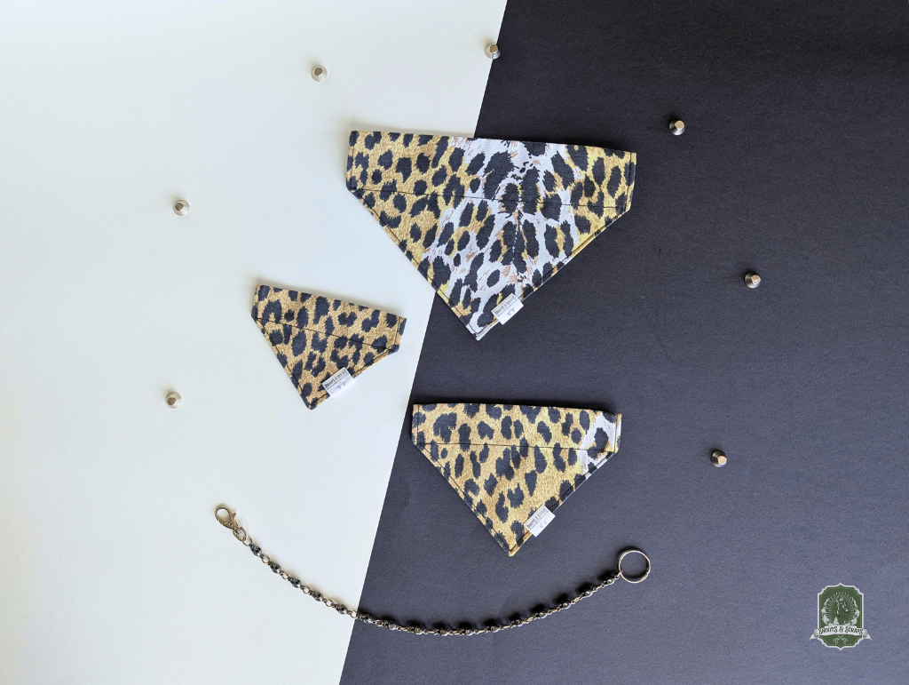 Leopard print dog bandanas on a black and white background