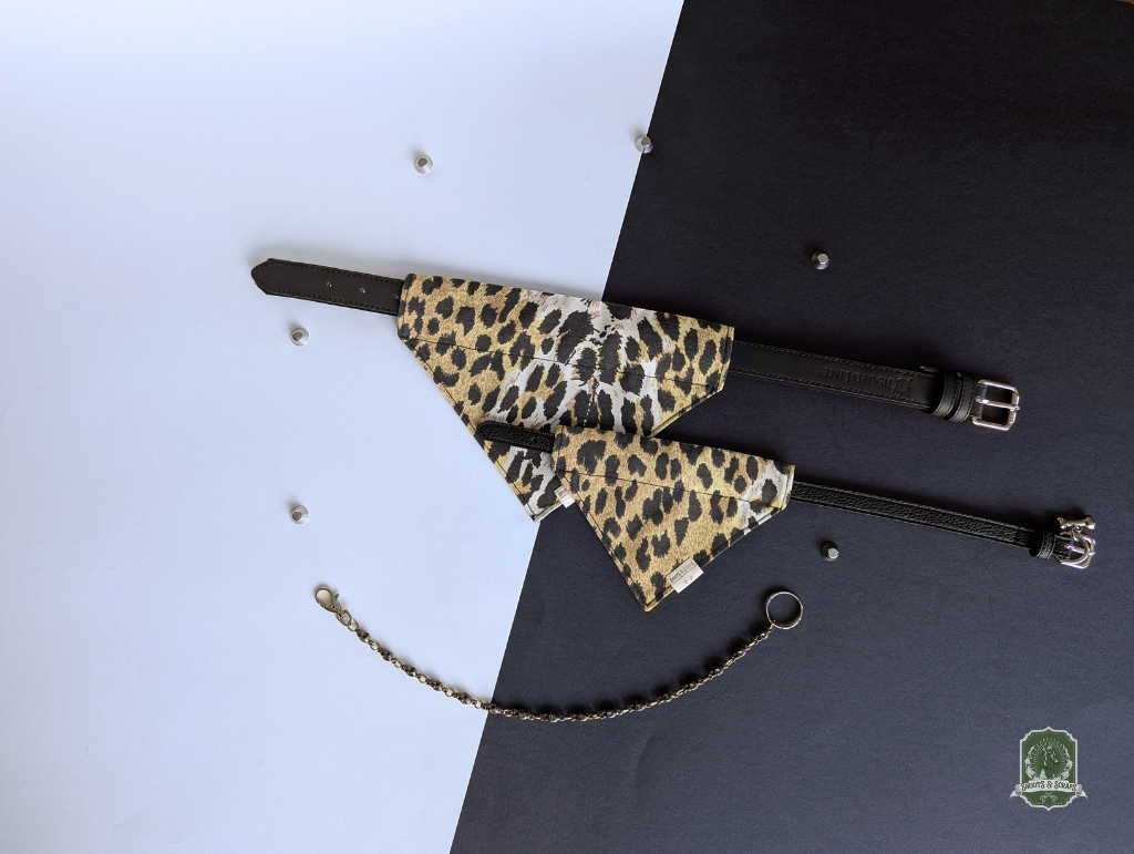 Leopard print dog bandanas on a black and white background