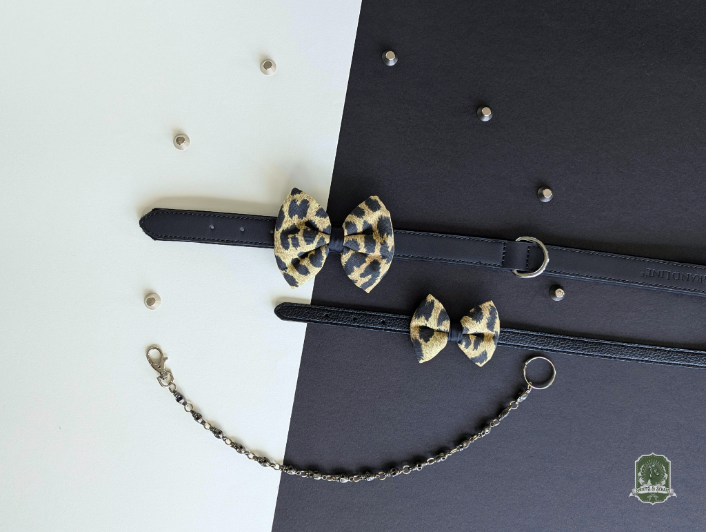 Leopard print pet bow ties on a white and black background