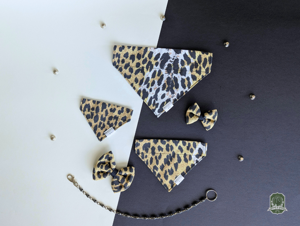 Leopard print dog bandanas and bow ties on a black and white background