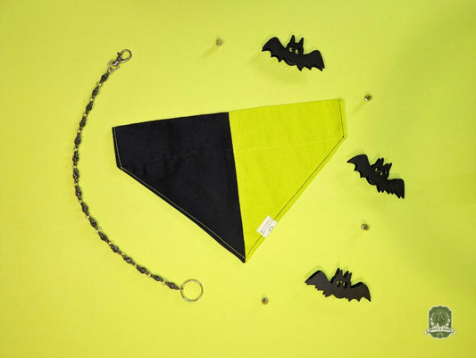 Black slide on collar pet bandana with a chain and small bats on a yellow background